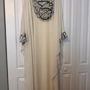 Elegant Cream kaftan with arabic calligraphy